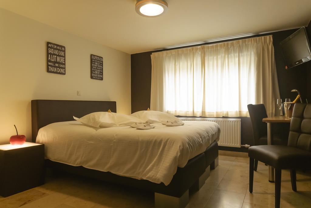 Hotel Pracha Borgloon Habitación foto